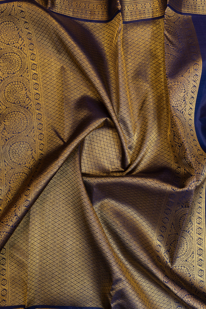 Carmine red and blue Laksha buttas pure Kanchipuram silk saree