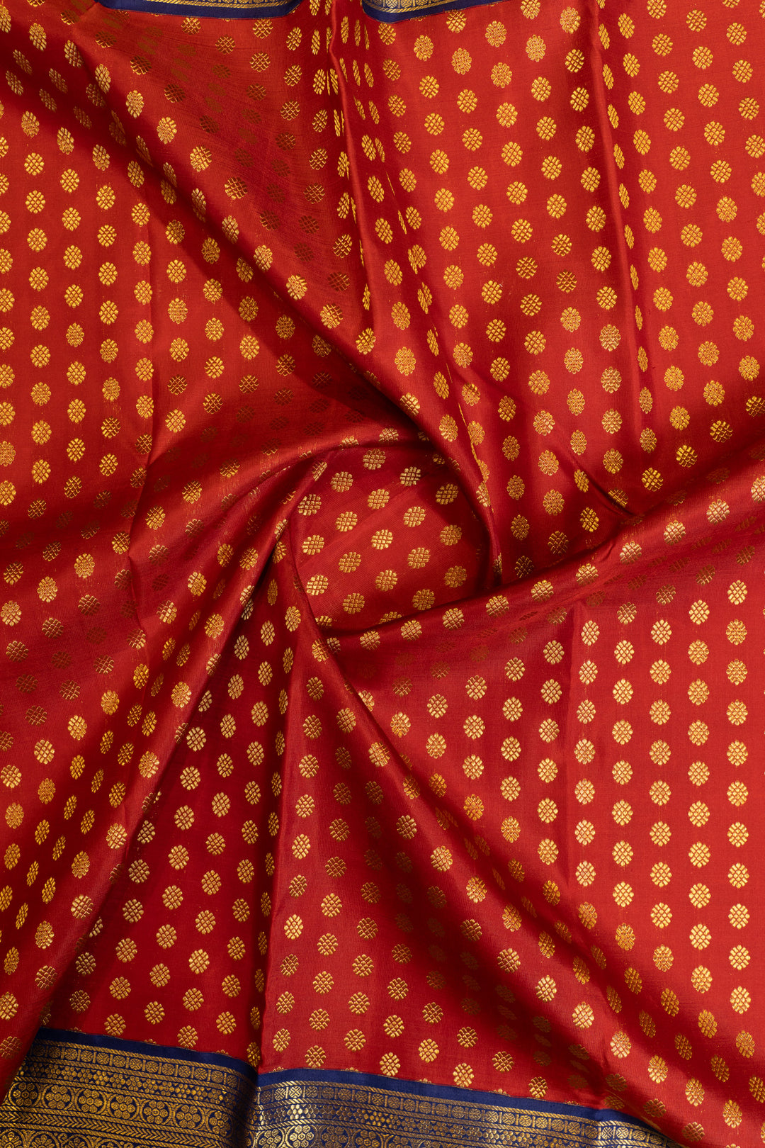 Carmine red and blue Laksha buttas pure Kanchipuram silk saree
