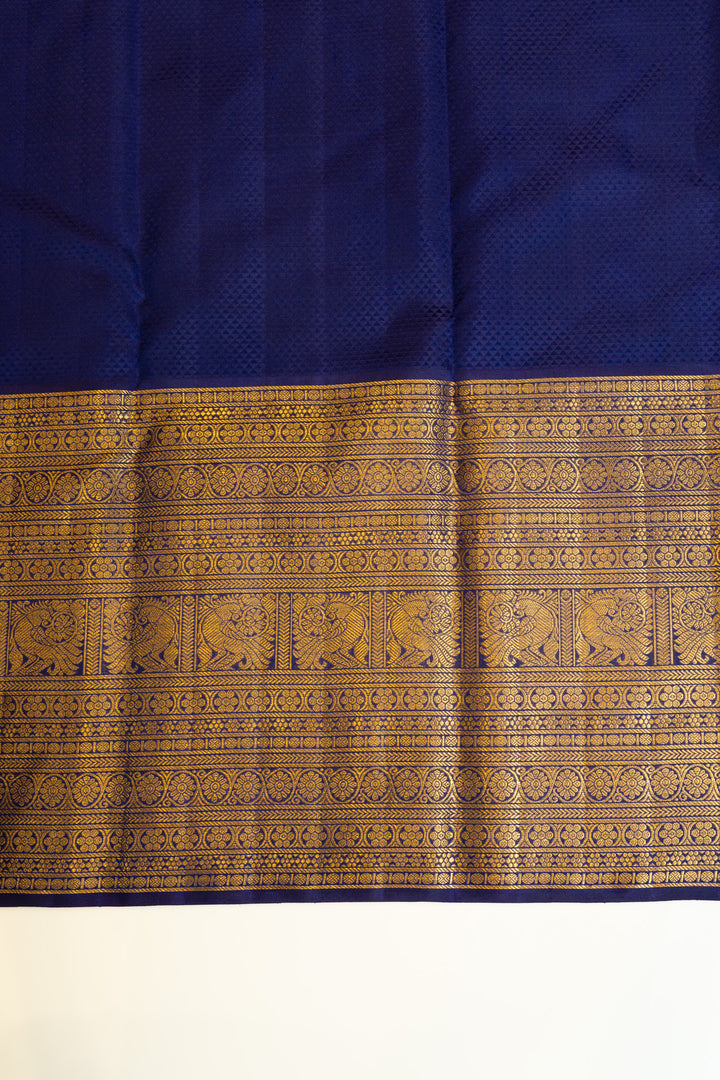 Carmine red and blue Laksha buttas pure Kanchipuram silk saree