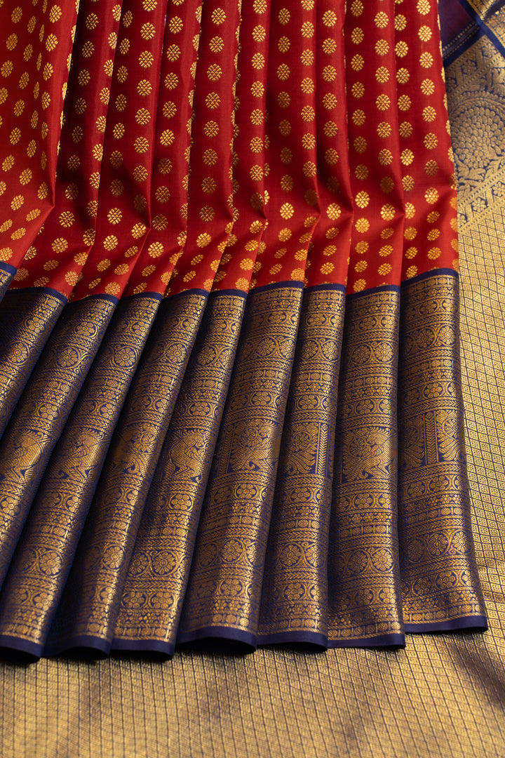 Carmine red and blue Laksha buttas pure Kanchipuram silk saree