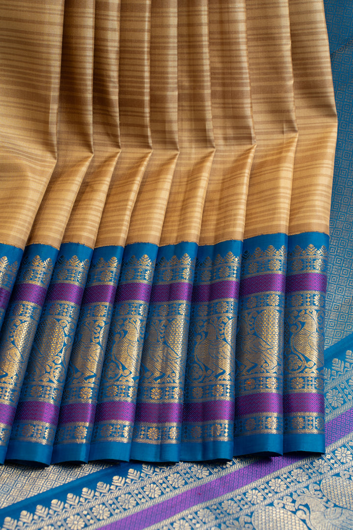 Beige and anandha blue self stripes pure Kanchipuram silk saree