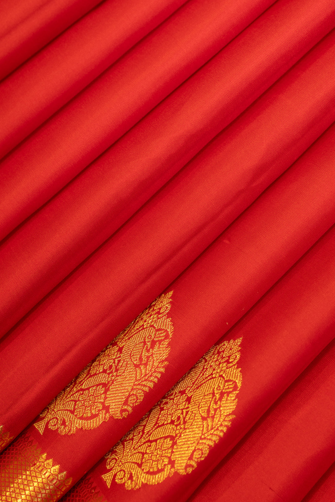 Red small border pure Kanchipuram silk saree