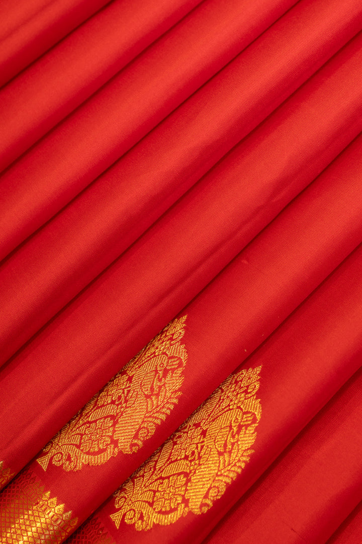 Red small border pure Kanchipuram silk saree