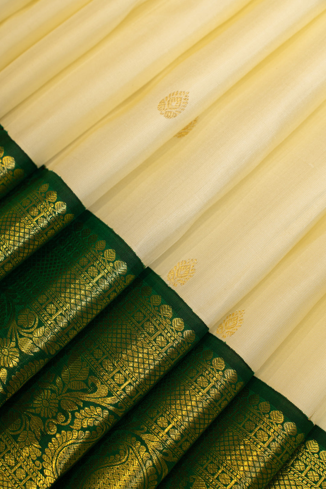 Pearl white and green traditional pure Kanchipuram silk saree