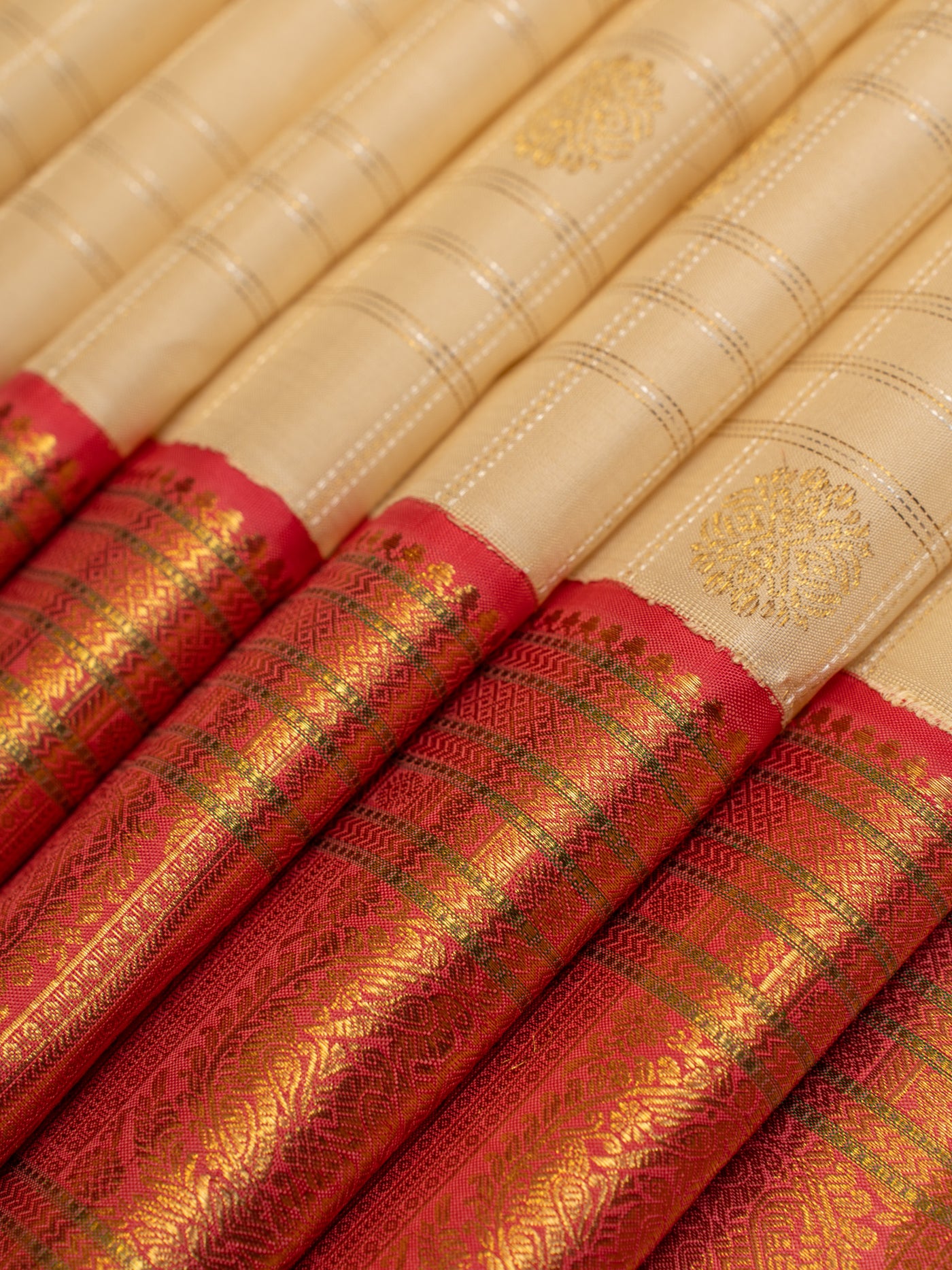 Ivory and pink pure zari kanjivaram silk saree