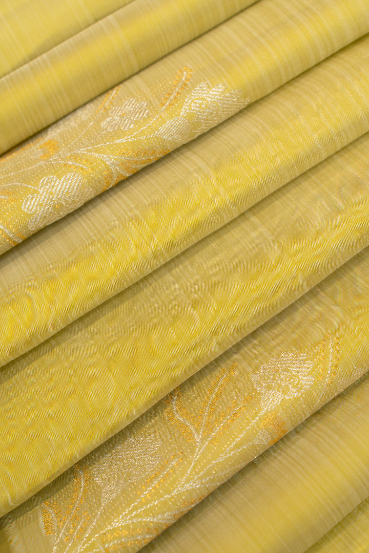 Lime yellow borderless pure Kanchipuram silk saree