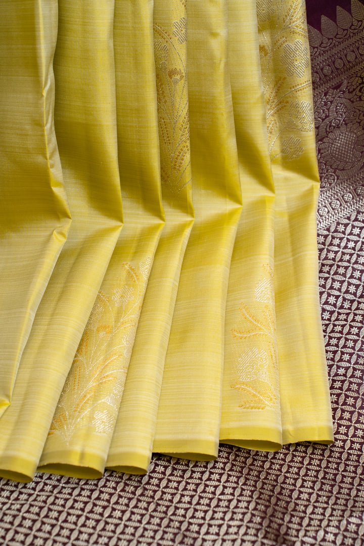 Lime yellow borderless pure Kanchipuram silk saree