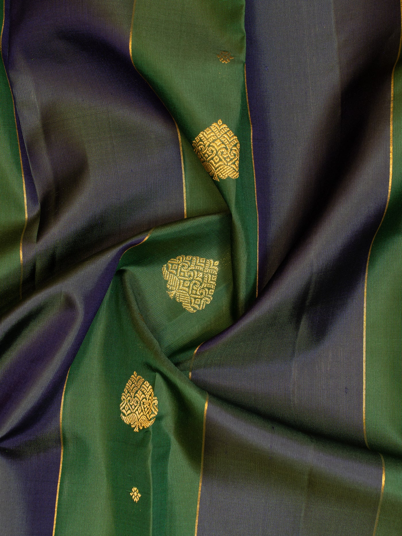 Bottle green and peacock blue panel pure zari concept kanjivaram silk saree