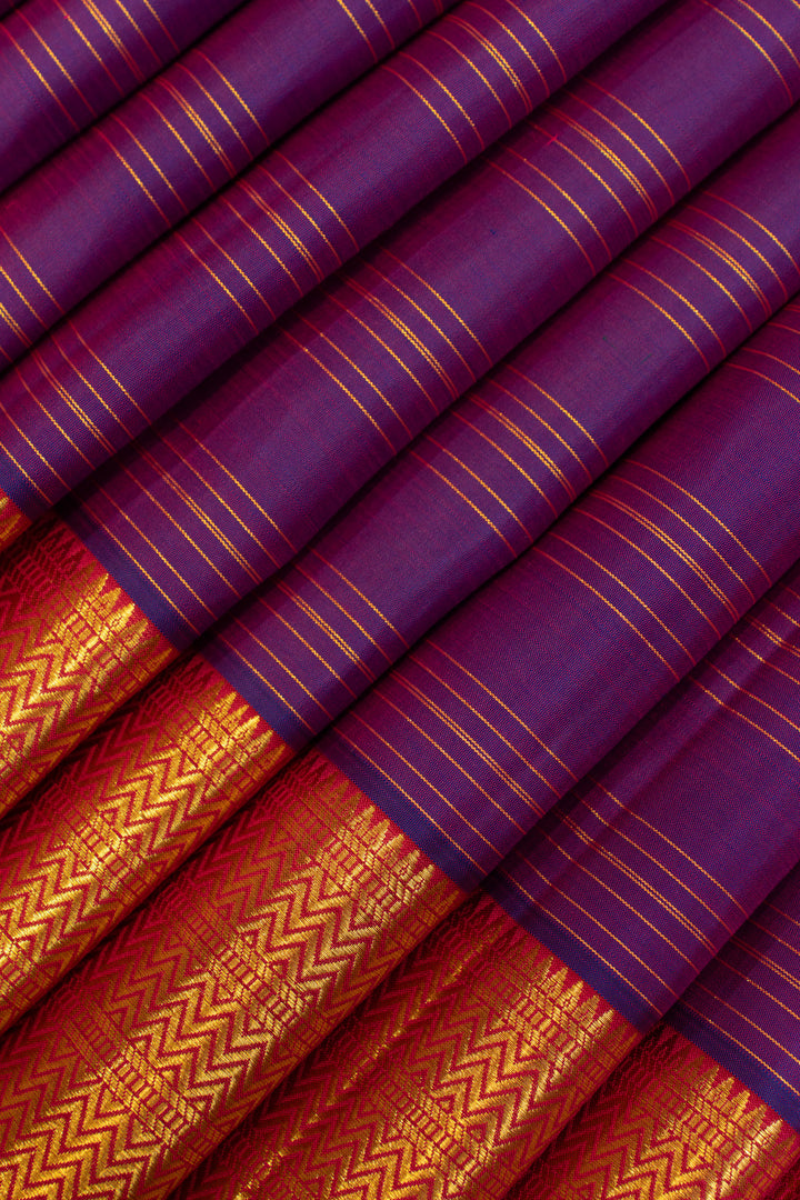 Traditional purple and red Kanchipuram bridal saree