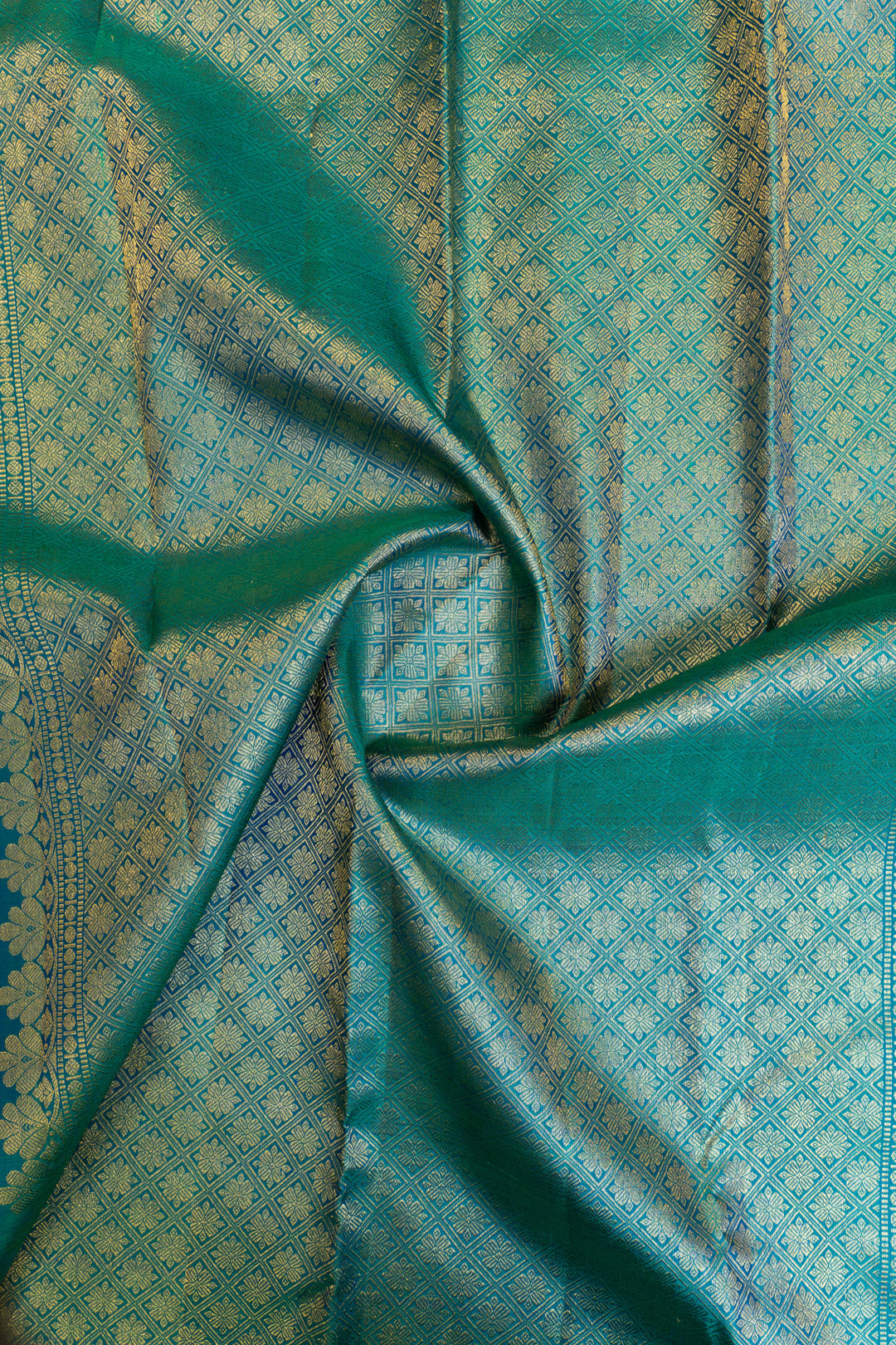 South Indian bridal silk saree with Iruthalaipakshi zari work