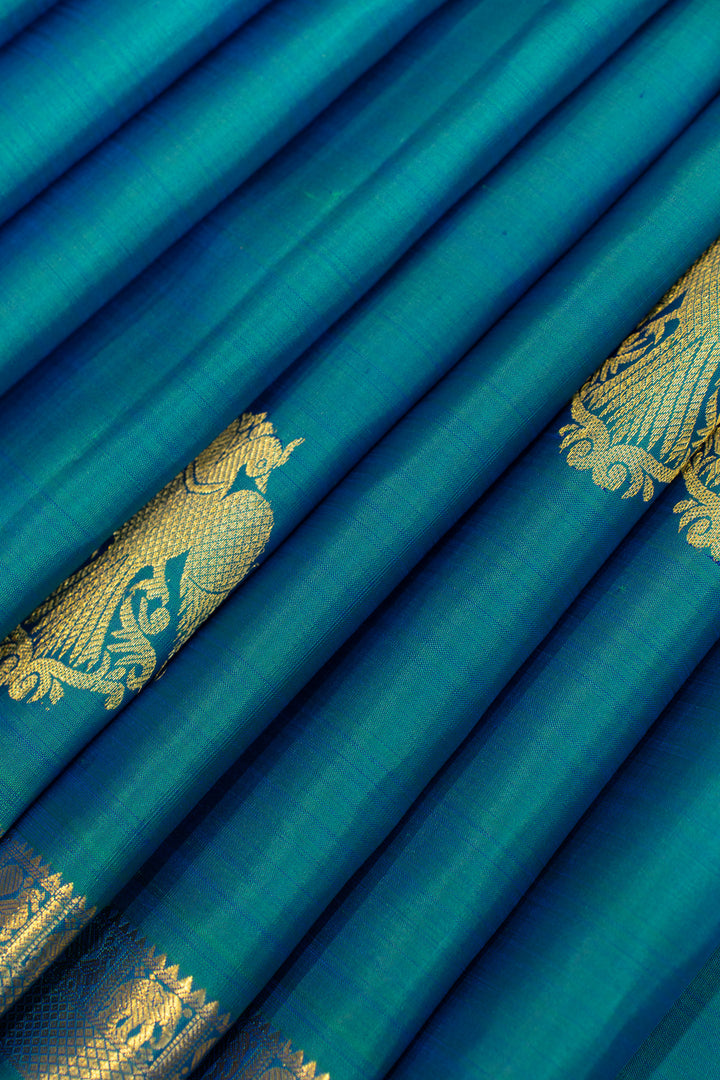 Traditional Iruthalaipakshi motif silk saree in blue