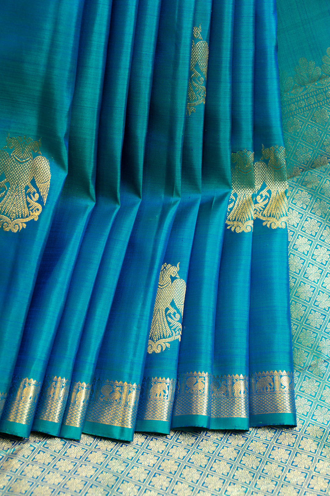 Peacock blue Iruthalaipakshi Kanchipuram silk saree