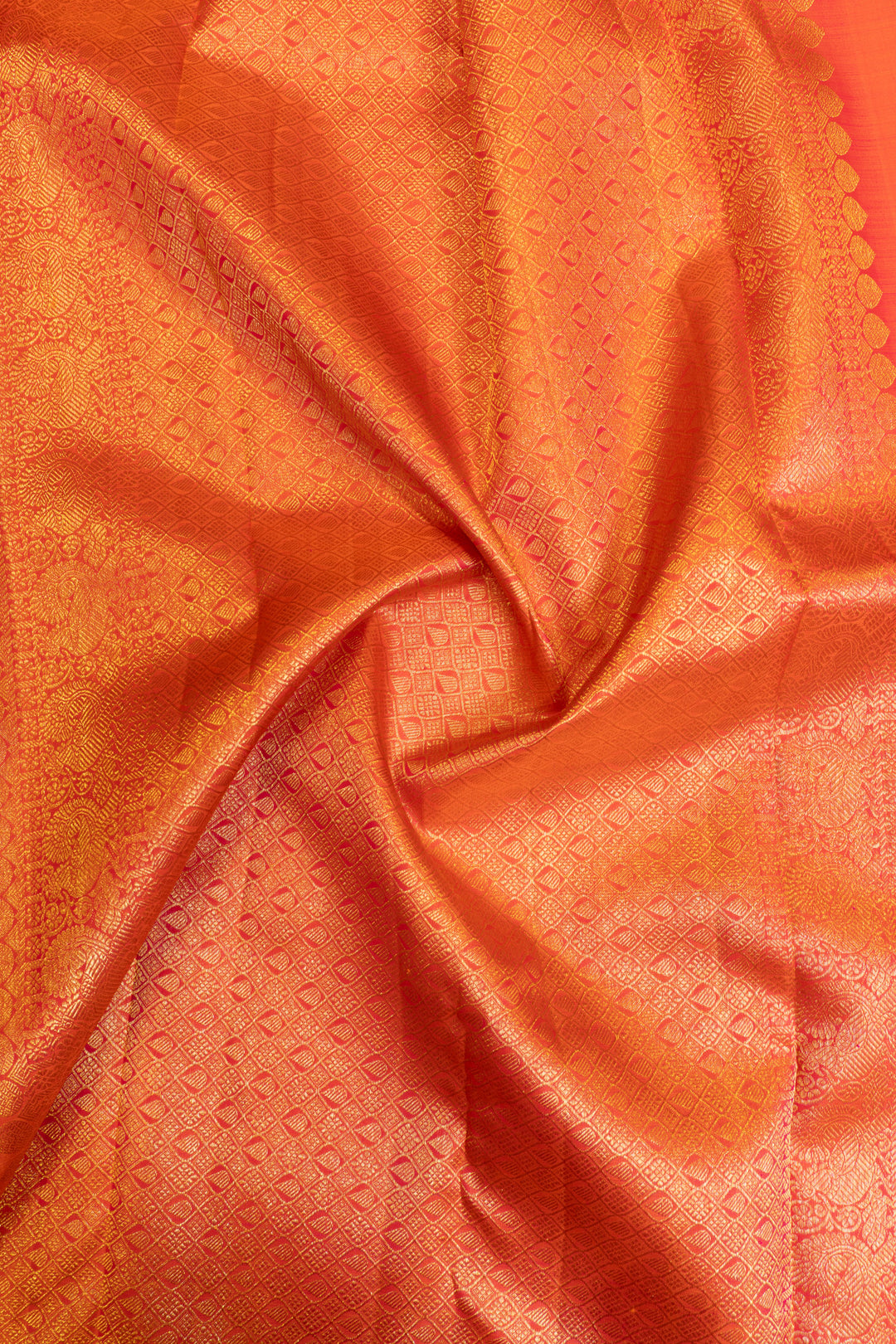 Peach bridal silk saree with traditional zari work
