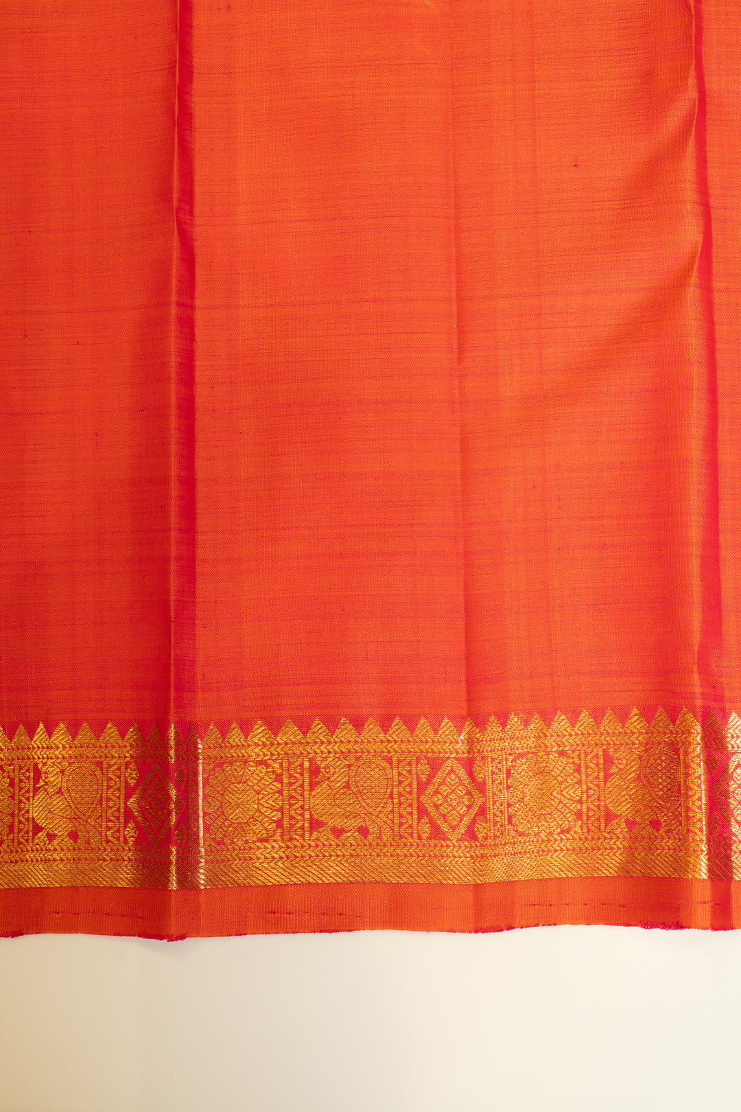 Elegant peach Kanchipuram saree with rich Murhuzari motifs