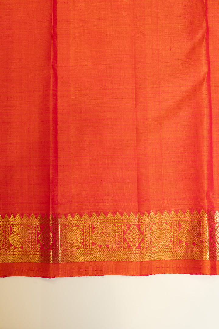 Elegant peach Kanchipuram saree with rich Murhuzari motifs