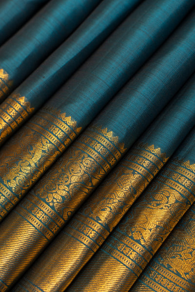 Peacock blue contrast selvedge pure Kanchipuram silk saree