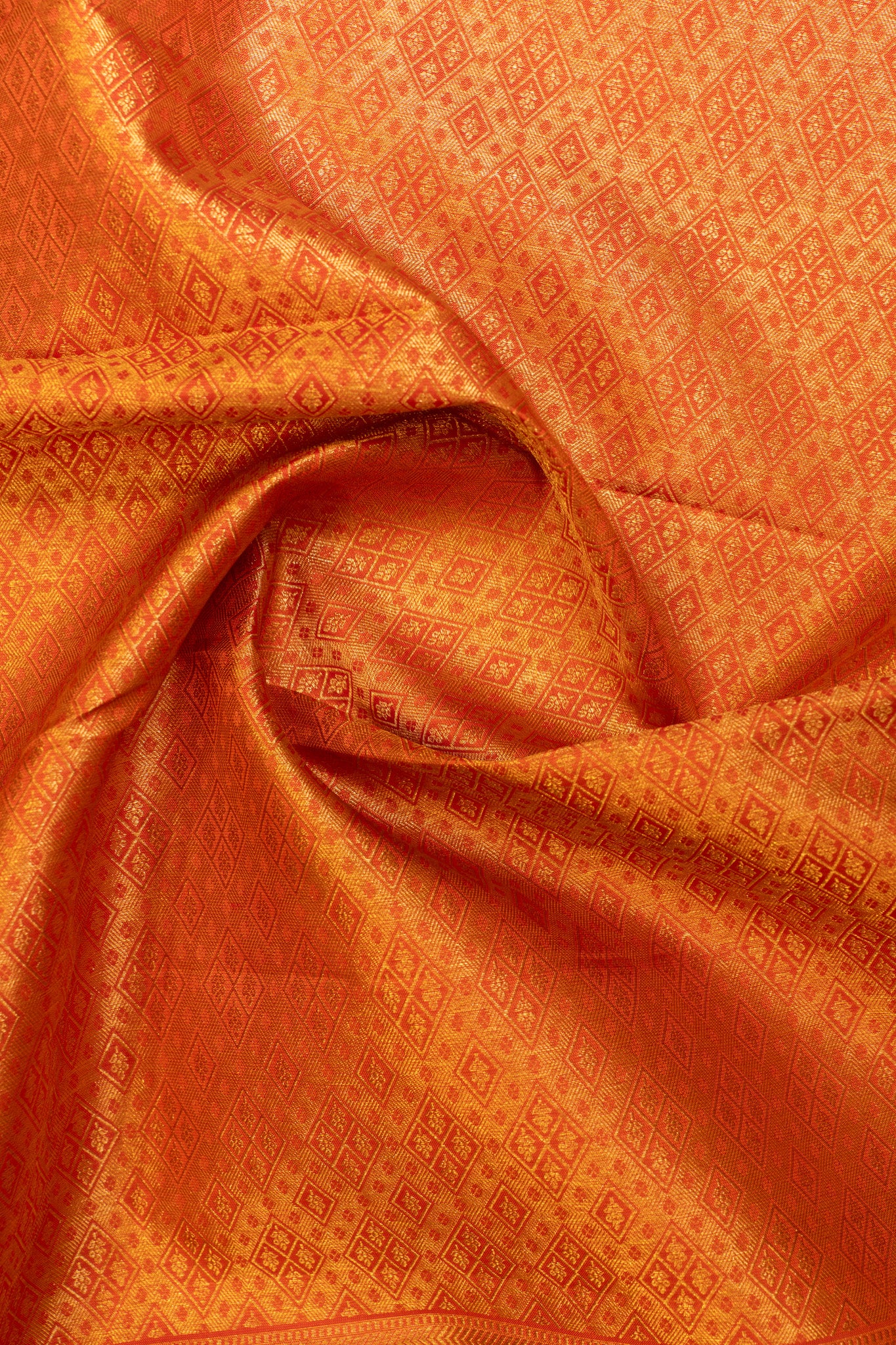 Detailed Thilakam Brocade Work in Gold on Orange Kanchipuram Silk Saree