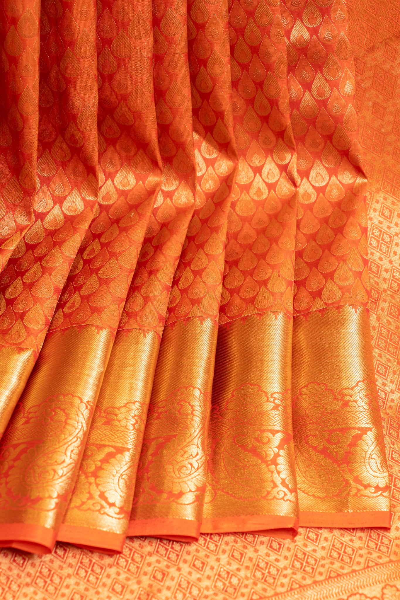 Full View of Orange Pure Kanchipuram Silk Saree Featuring Thilakam Brocade