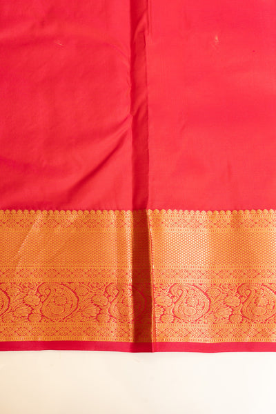 Blouse piece view of Bottle green and magenta brocade pure Kanchipuram silk saree