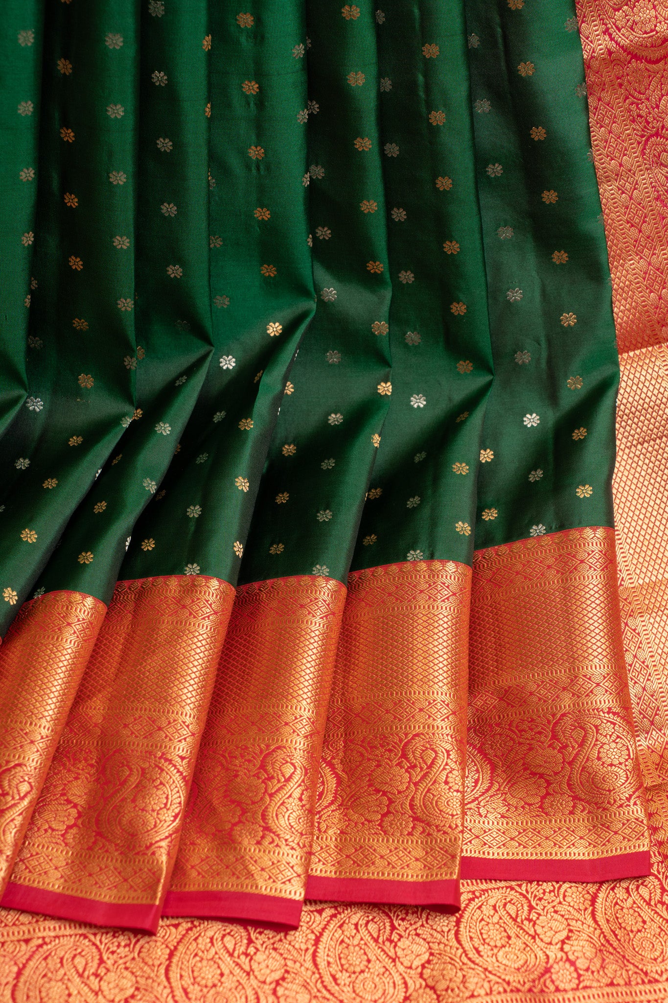 Full View of Woman in Bottle Green and Magenta Brocade Kanjivaram Silk Saree