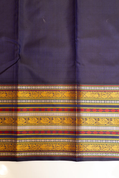 Coordinated blouse with the Lotus Link Thread Buttis Kanjivaram saree, adding a perfect finishing touch.
