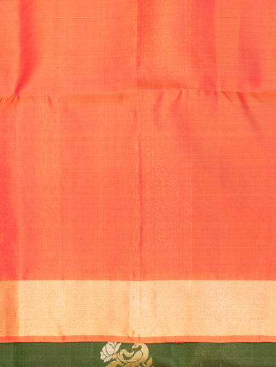 Indulge in luxury and refinement with our exquisite Bottle Green and Peach Soft Silk Saree. 