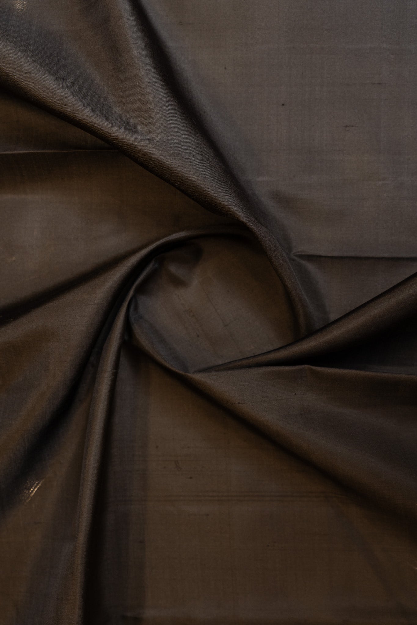 closeup body view of Black and peach pure Kanchipuram silk saree