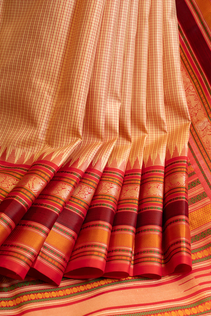 Orangish cream checks without zari pure Kanchipuram silk saree