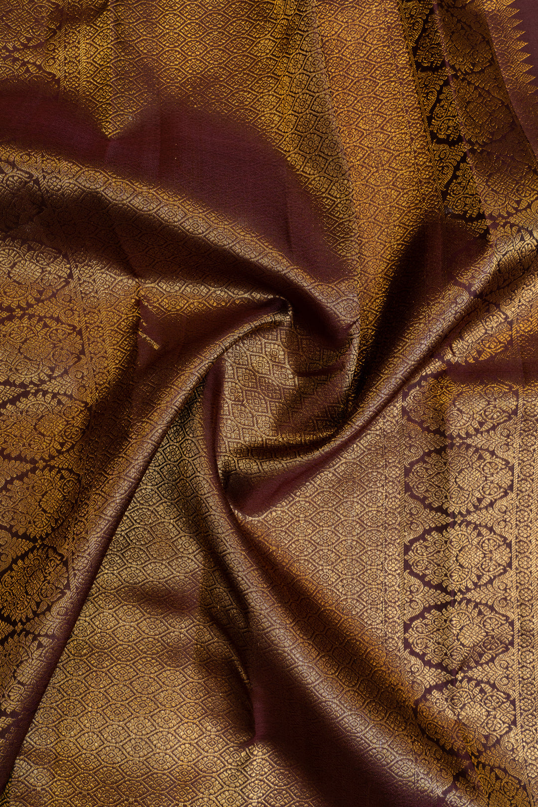 Maybe purple and rust pure Kanchipuram silk saree