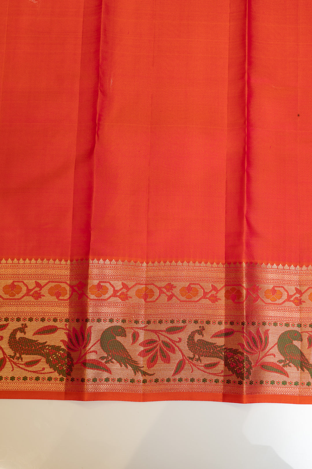 Maybe purple and rust pure Kanchipuram silk saree