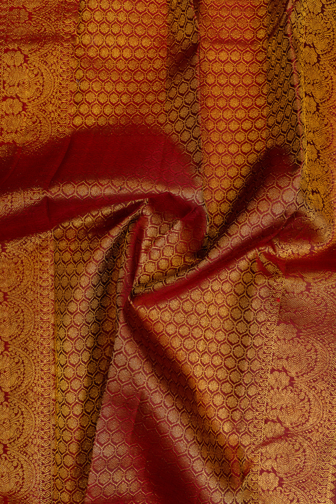 Maybe purple and rust pure Kanchipuram silk saree
