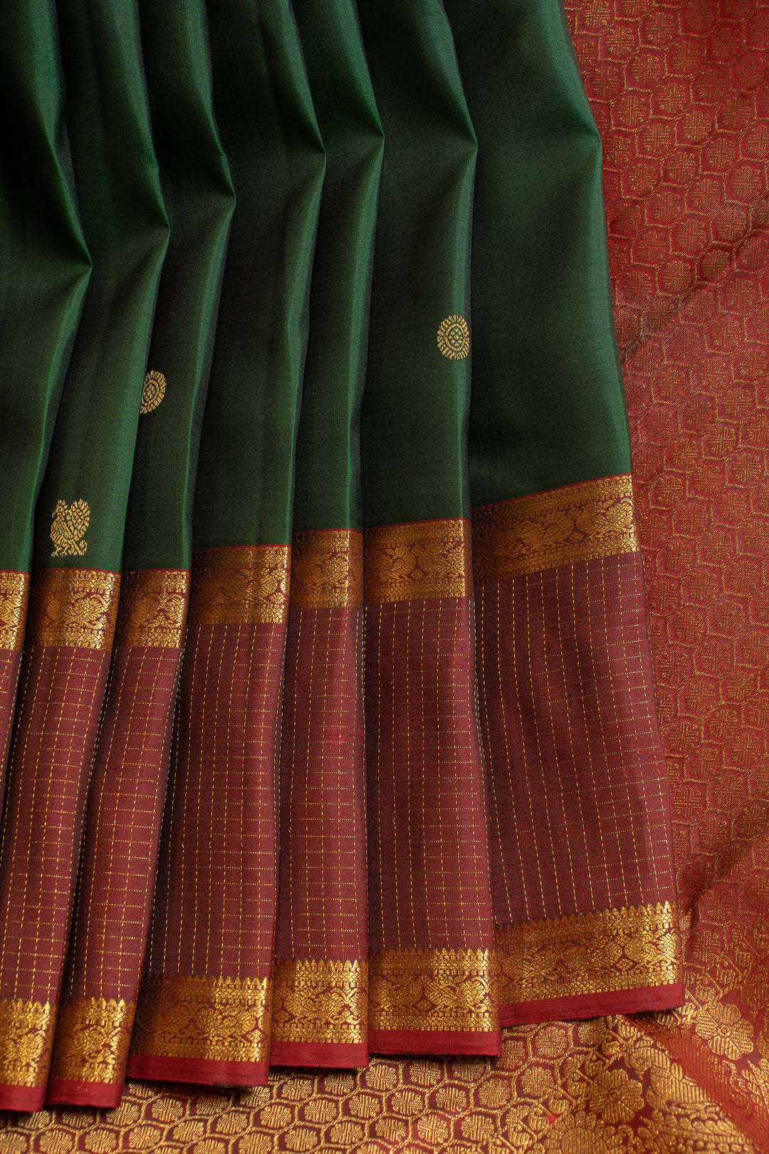 Maybe purple and rust pure Kanchipuram silk saree