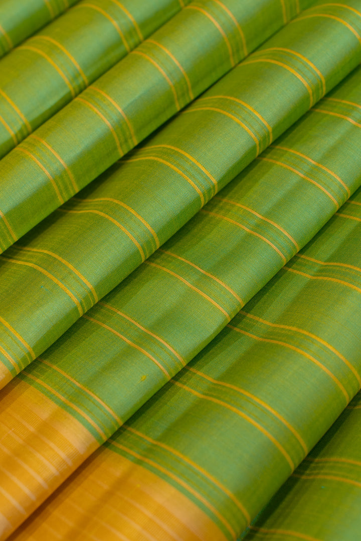 Pastel green and yellow stripes without zari pure Kanchipuram silk saree