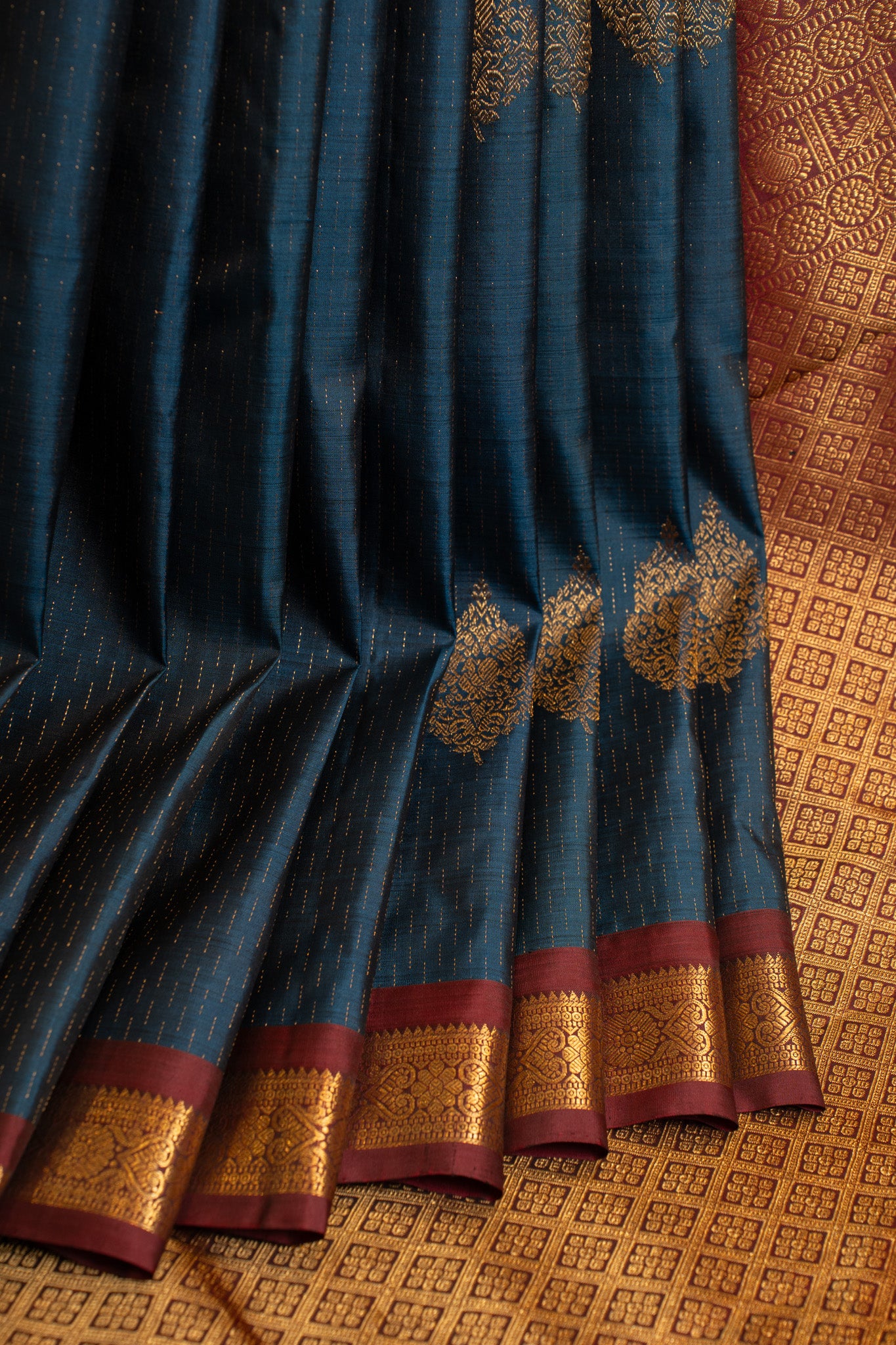 Peacock blue raindrop motifs small border pure Kanchipuram silk saree