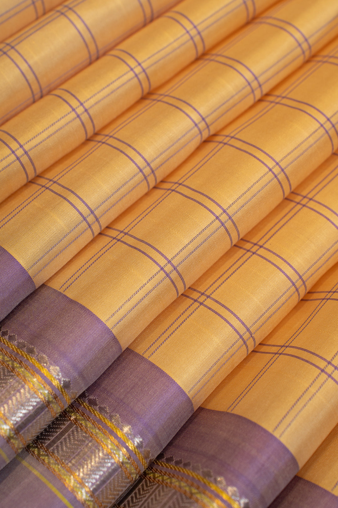 Pastel yellow and lilac pure Kanchipuram silk saree