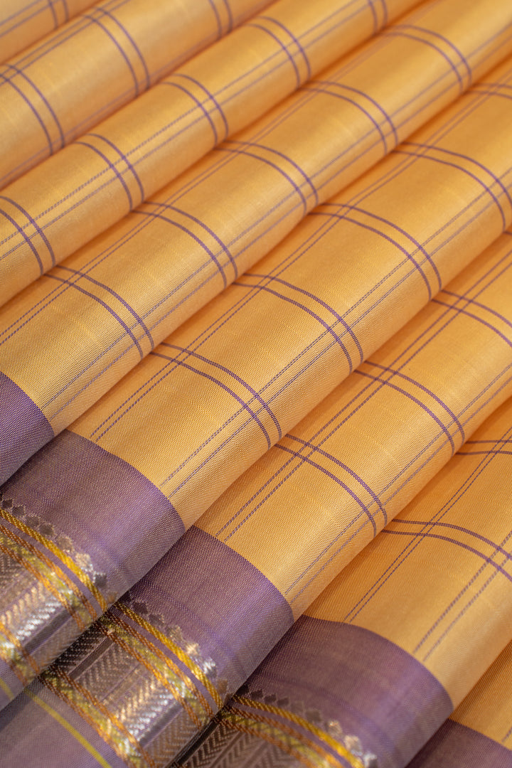 Pastel yellow and lilac pure Kanchipuram silk saree