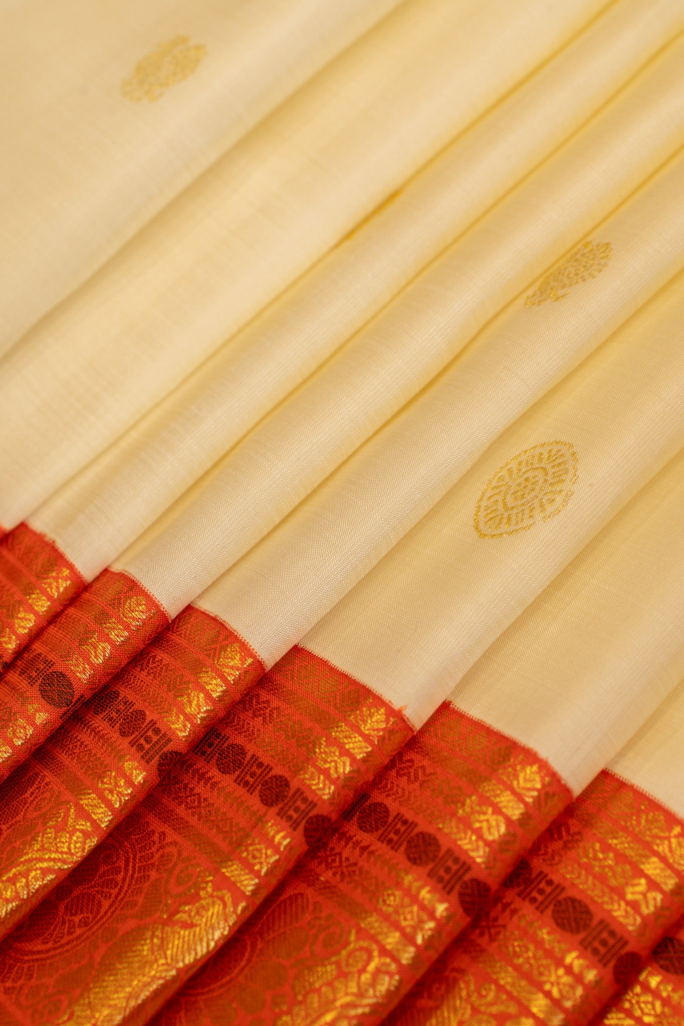 Off white and orange traditional pure Kanchipuram silk saree