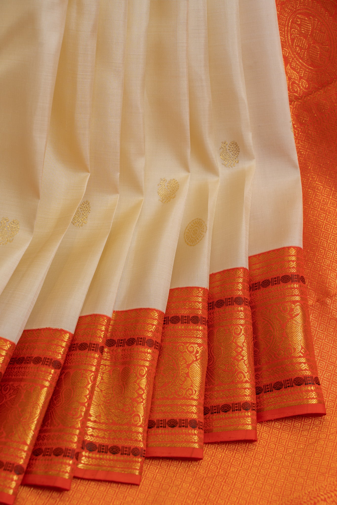 Off white and orange traditional pure Kanchipuram silk saree