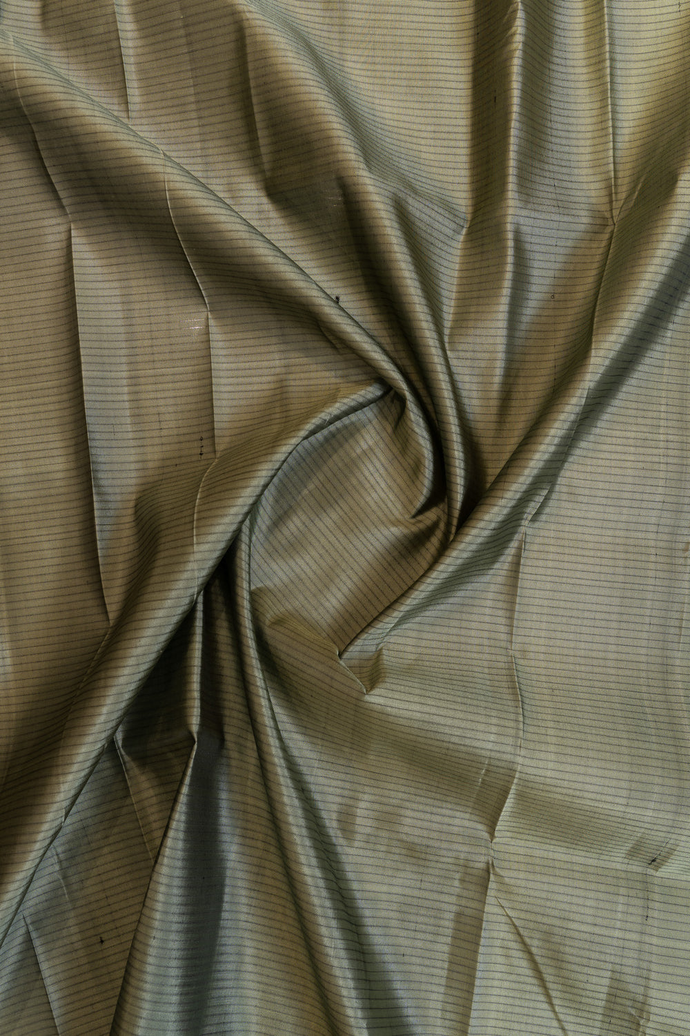 Close-up of beige fabric with a subtle pattern