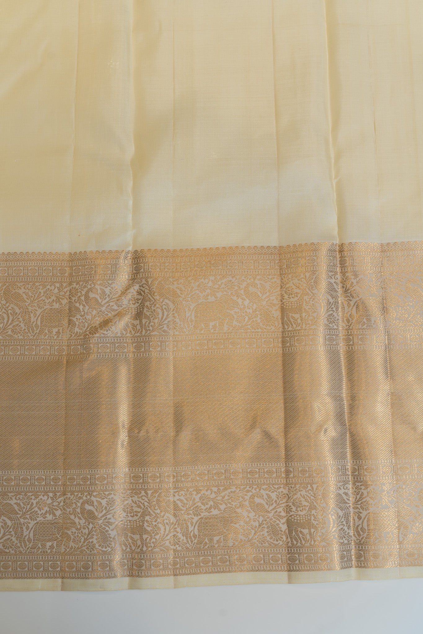 Off white and gold pure Kanchipuram silk saree