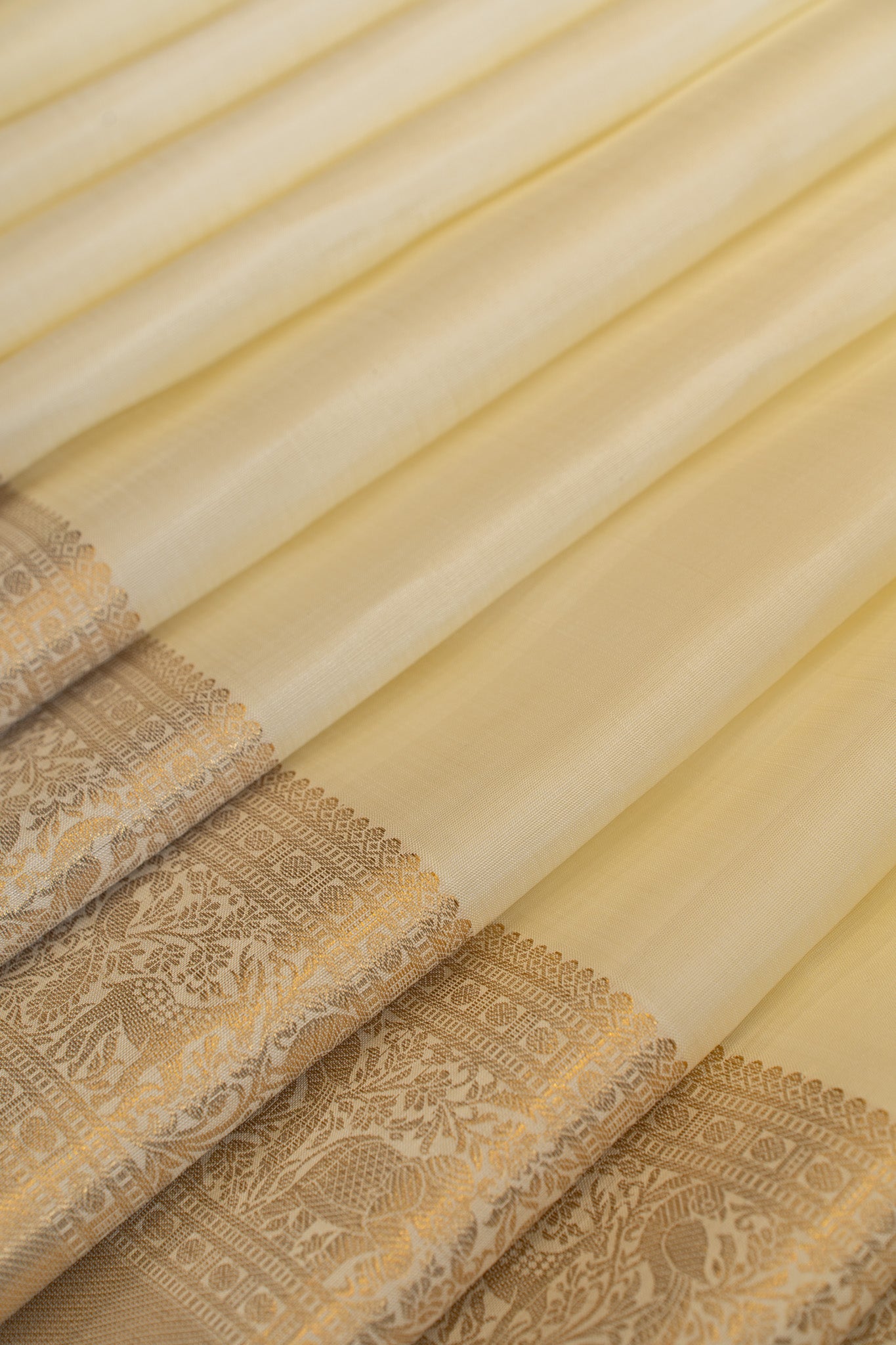 Off white and gold pure Kanchipuram silk saree