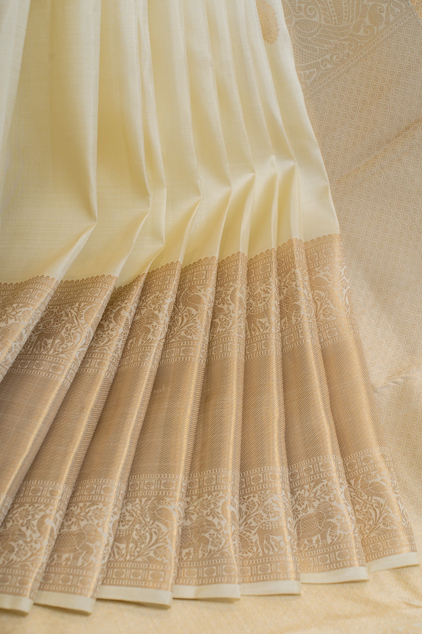 Off white and gold pure Kanchipuram silk saree