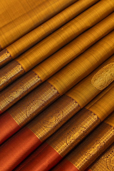 Mustard gold and orange pure Kanchipuram silk saree