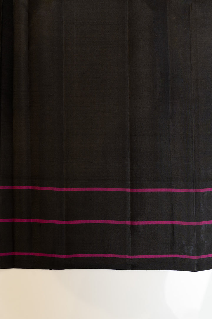 Black fabric with pink stripes on a white background