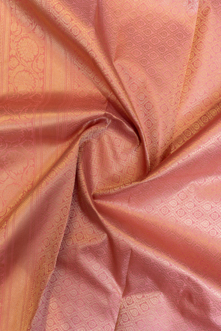 Close-up of pink fabric with intricate patterns
