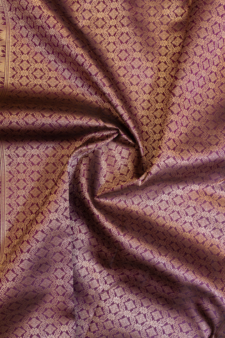 Close-up of purple fabric with a subtle pattern