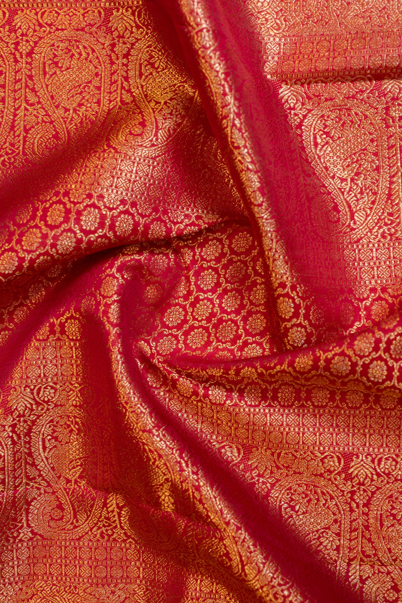 Reddish orange brocade pure Kanchipuram silk saree