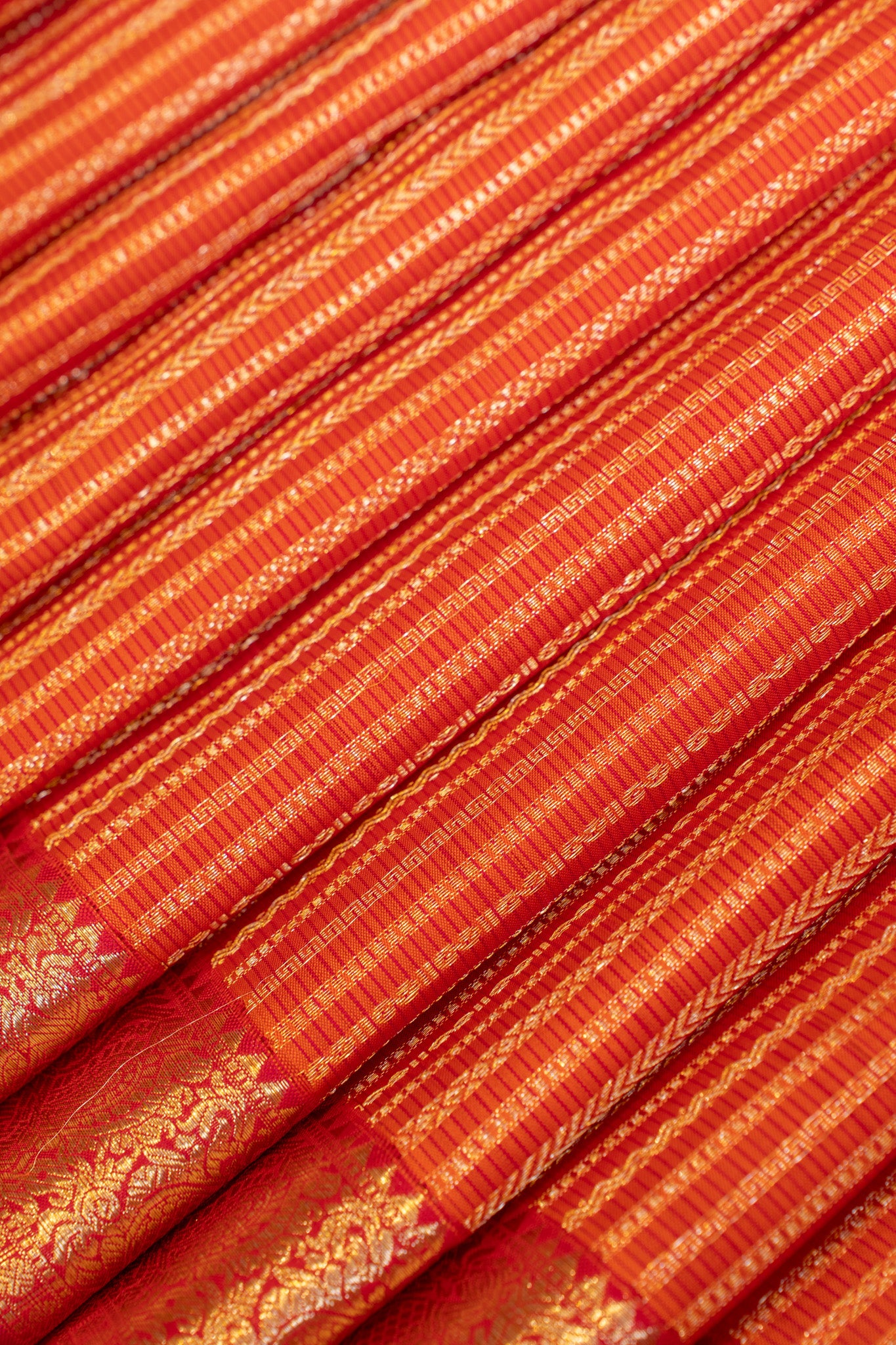 Reddish orange brocade pure Kanchipuram silk saree