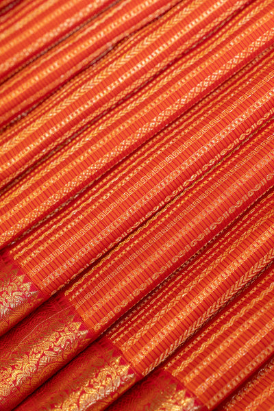 Reddish orange brocade pure Kanchipuram silk saree