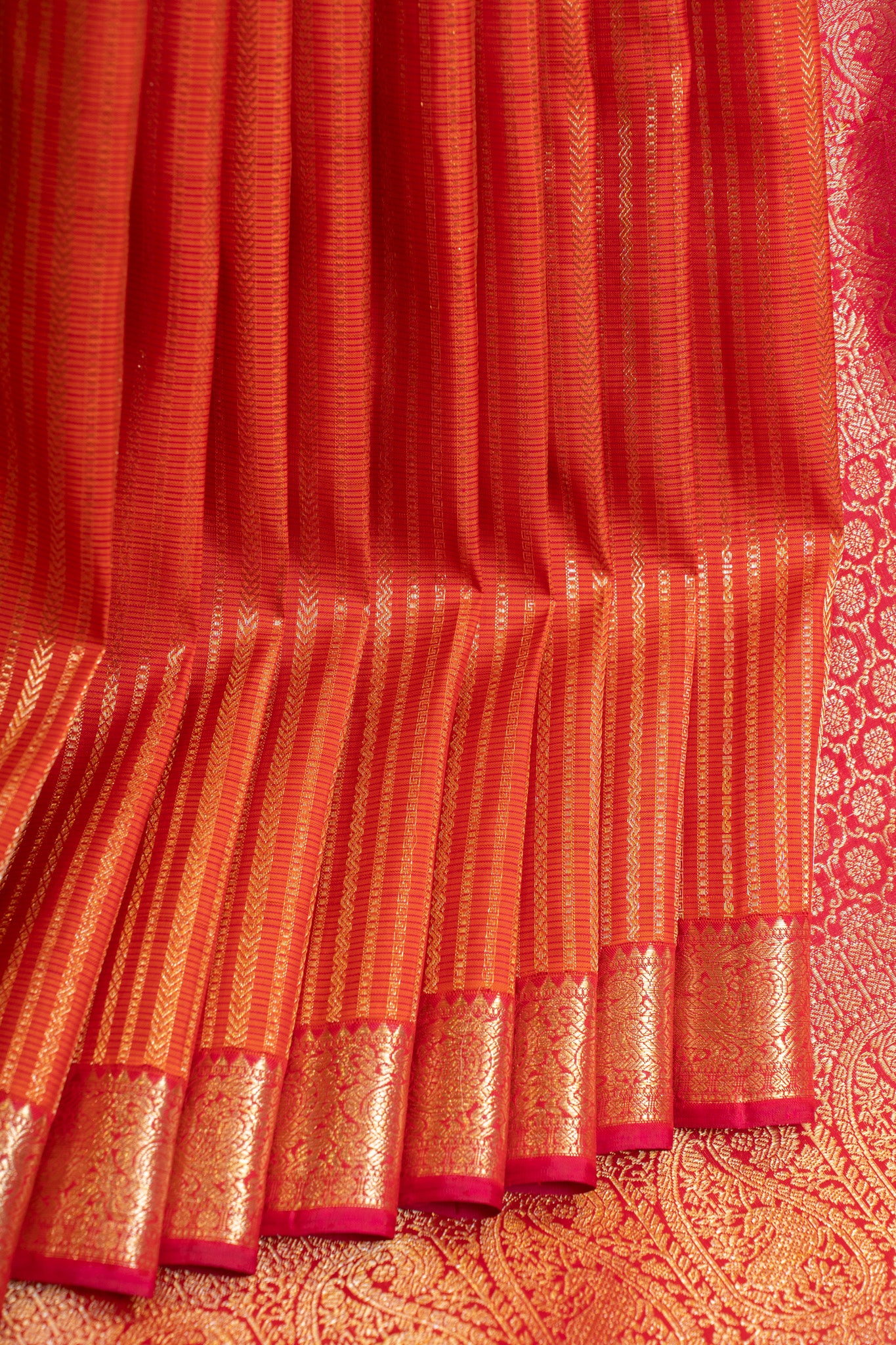 Reddish orange brocade pure Kanchipuram silk saree